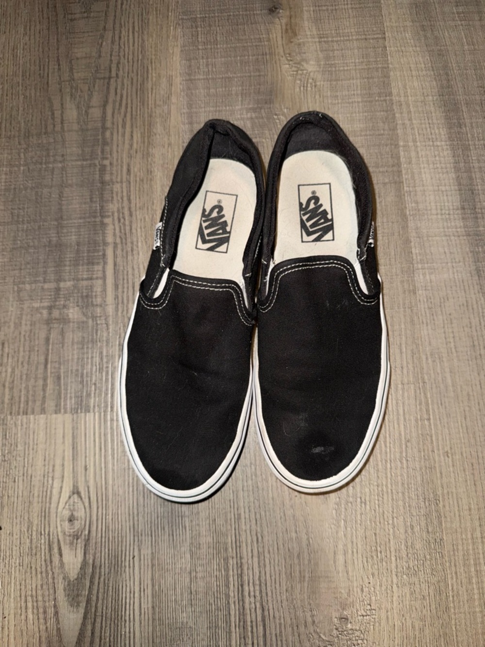 Vans Black & White Slip-On Canvas Sneakers